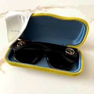 Authentic Gucci women’s glasses-black/gold.